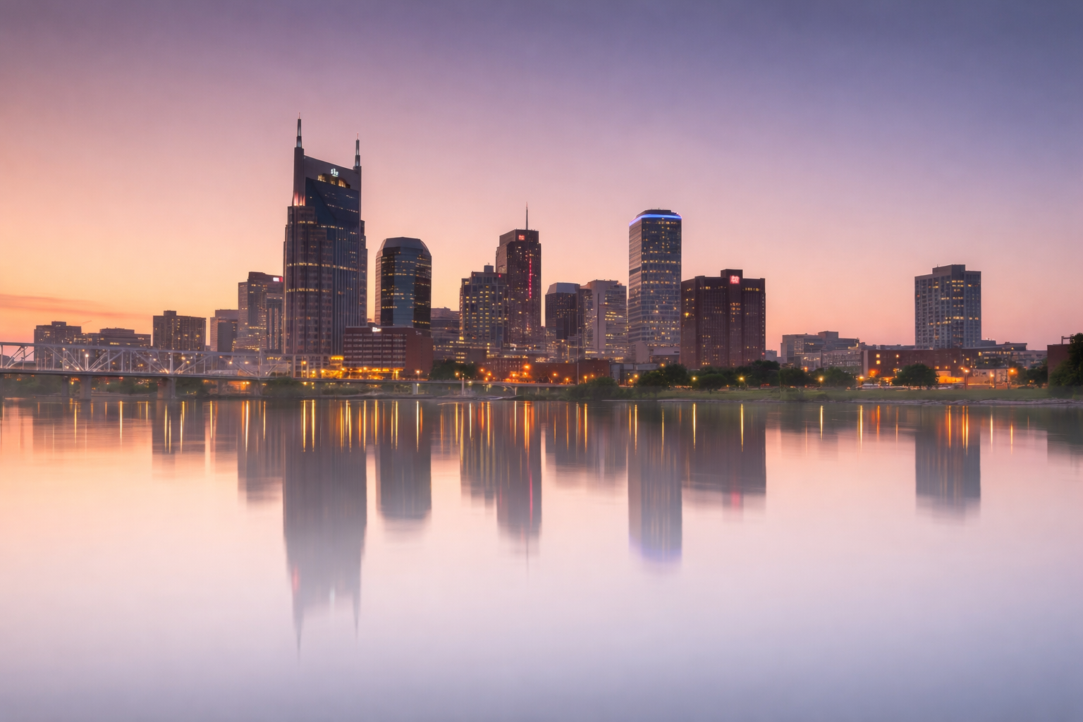 Nashville Skyline image Nashville skyline at dusk reflected on the Cumberland River